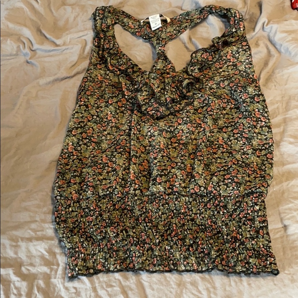 Floral pattern tank with ruffle detail!